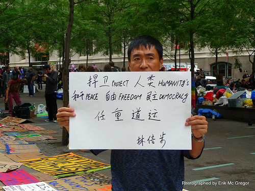 man holding sign